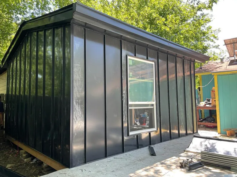 Black standing seam metal wall panels for Roof Inspection in Medway